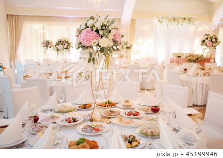 Wedding bouquet in restaurant on the table. Pink and white flowers. Rose and hydrangea 45199946