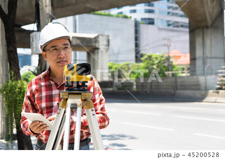 Engineer man survey with tacheometer or theodolite 45200528