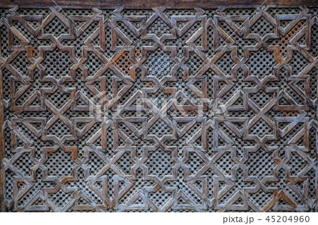 Carved wooden pattern in Madrasa Bou Inania wooded Carved wooden pattern in Madrasa Bou Inania wooded 45204960