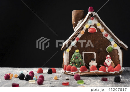homemade gingerbread house on a table homemade gingerbread house on a table 45207817