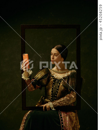 Portrait of a girl wearing a retro princess or countess dress Portrait of a girl wearing a retro princess or countess dress 45208259