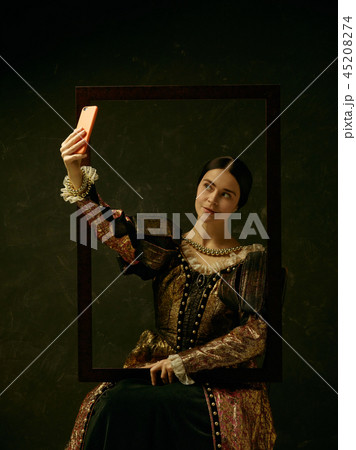 Portrait of a girl wearing a retro princess or countess dress Portrait of a girl wearing a retro princess or countess dress 45208274