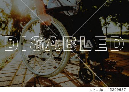 Sunny Road . Wheel of Wheelchair . Close Up . 45209687