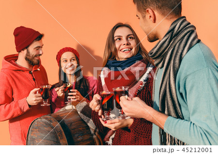 Smiling european men and women during party photoshoot. 45212001