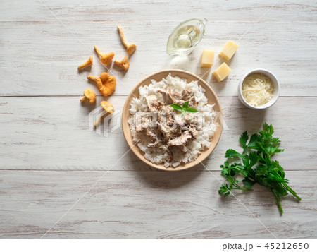 Rice with mushrooms on a portion pan. Top view. 45212650