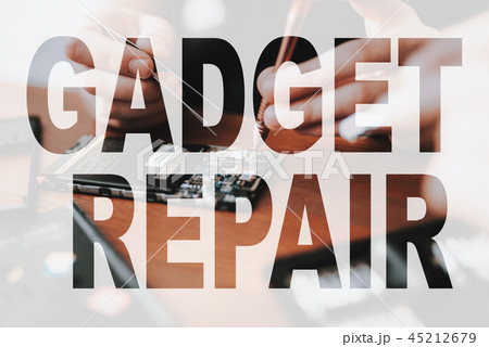 Hands of Man Disassemble Phone with Screwdriver. Hands of Man Disassemble Phone with Screwdriver. 45212679
