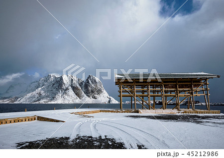 Drying flakes for stockfish cod fish in winter. Lofoten islands, Drying flakes for stockfish cod fish in winter. Lofoten islands, 45212986