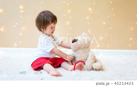 Toddler boy with teddy bear doctor Toddler boy with teddy bear doctor 45213423