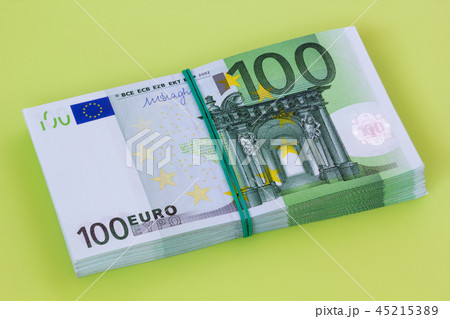 pile of one hundred euro banknotes pile of one hundred euro banknotes 45215389