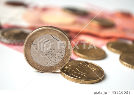 euro coins and bank notes on white background 45216032