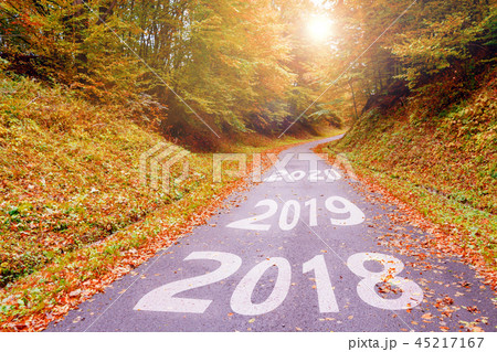 Inscription 2018, 2019, 2020 on the road 45217167