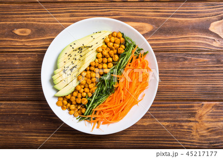 Buddha bowl with avocado cucumber carrot chickpea 45217177