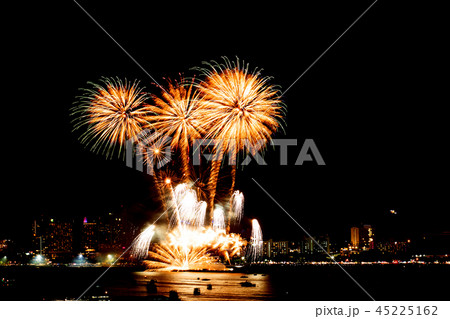 Many flashing fireworks with night cityscape 45225162
