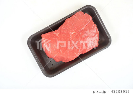 Big red meat in package, on white background 45233915