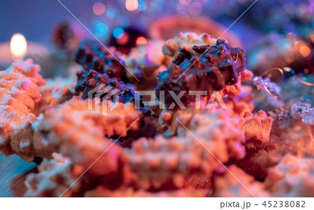 Spritz biscuits Christmas cookies on a decorated table Spritz biscuits Christmas cookies on a decorated table 45238082