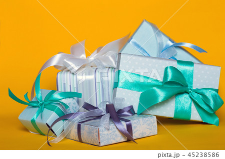 gift box on yellow background gift box on yellow background 45238586