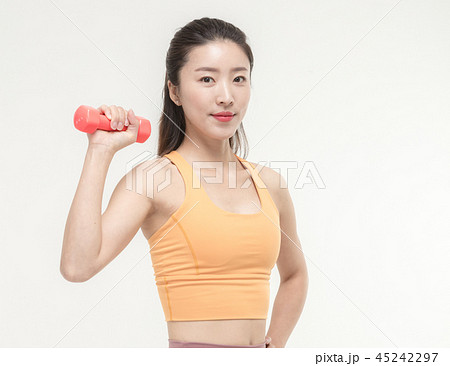 Korean woman exercising with dumbbells 45242297