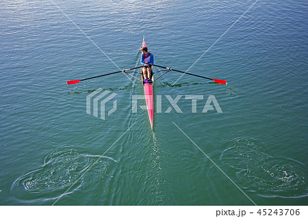 Single scull rowing competitor, rowing race  45243706