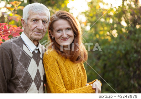 happy family - grandfather and granddaughter 45243979