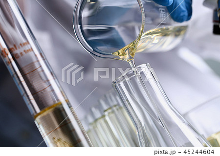 Yellow liquid spilled petrol additive innovative supply 45244604