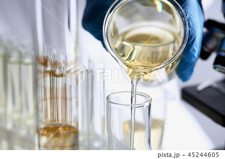 Yellow liquid spilled petrol additive innovative supply Yellow liquid spilled petrol additive innovative supply 45244605