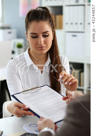 Beautiful woman offer contract form on clipboard pad 45244657