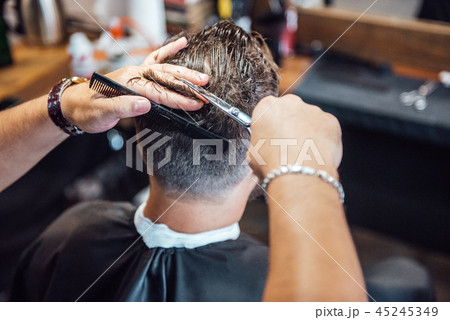 the master in the barbershop shaves and cuts man the master in the barbershop shaves and cuts man 45245349