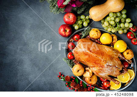 Thanksgiving roasted whole goose on rustic table Thanksgiving roasted whole goose on rustic table 45248098
