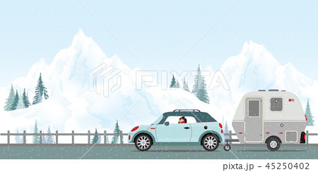 Happy couple driving car on road in winter. 45250402