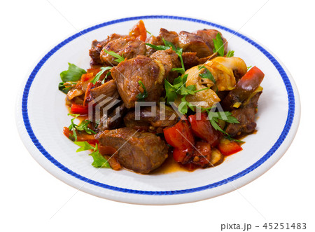 Meat baked with mushrooms and vegetables 45251483