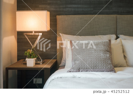 Hotel style bedding with white shade reading lamp Hotel style bedding with white shade reading lamp 45252512