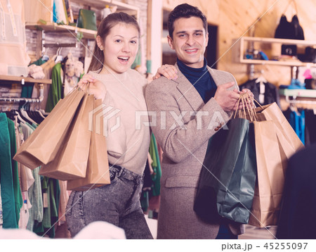 Couple is satisfied shopping Couple is satisfied shopping 45255097