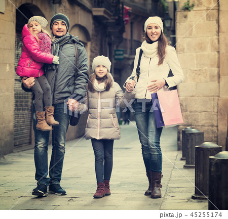 Family with two children posing Family with two children posing 45255174
