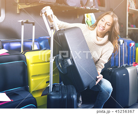 Woman selecting handy trunk 45256367