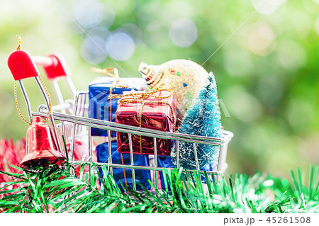 Full of Xmas decorative items in shopping cart 45261508