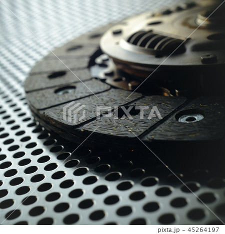 Car clutch on a metal surface 45264197