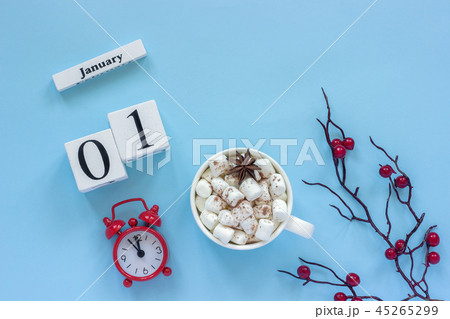 January 1st Cup of cocoa with marshmallows and alarm clock 45265299
