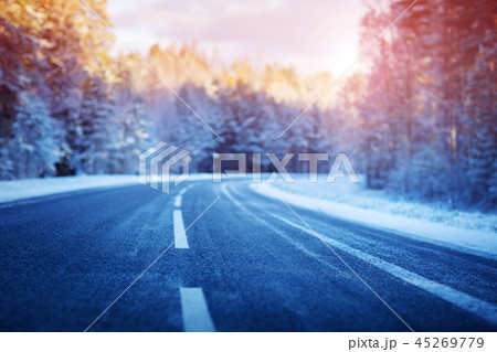 winter road, covered with snow on sunny day 45269779
