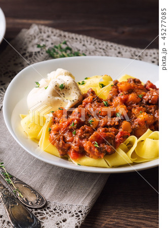 Pappardelle pasta with ragout and burrata cheese 45277085