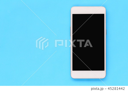black screen of smartphone on blue paper background. black screen of smartphone on blue paper background. 45281442