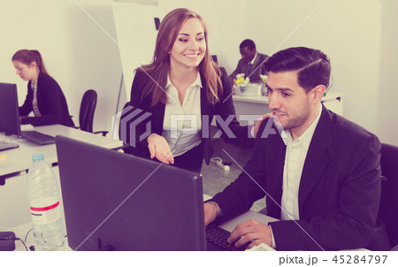 Flirting between colleagues in office 45284797