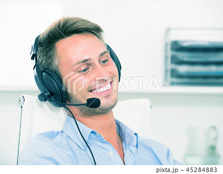 Operator answering at call center 45284883