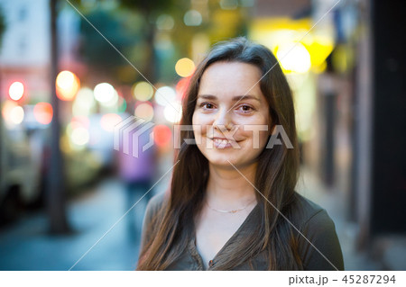 Closeup portrait of woman outdoors Closeup portrait of woman outdoors 45287294