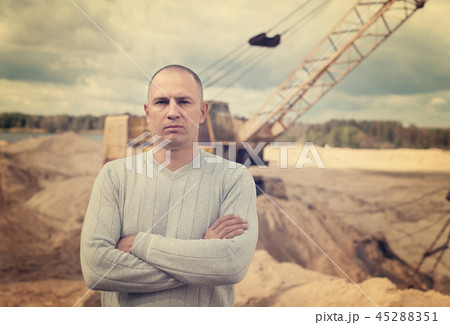 worker at sand pit worker at sand pit 45288351