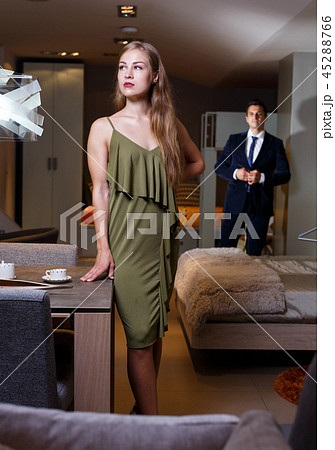 Elegant girl in home interior with man Elegant girl in home interior with man 45288766