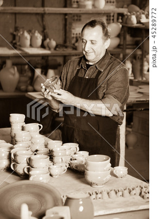 Happy potter at the workshop Happy potter at the workshop 45289772