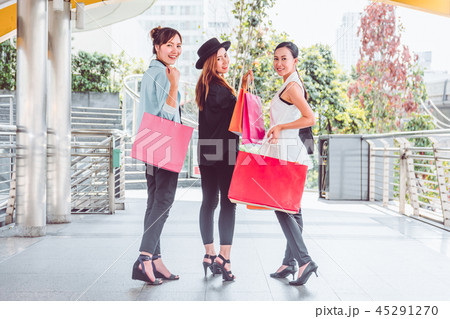 Happy woman with shopping bags enjoying in shop Happy woman with shopping bags enjoying in shop 45291270