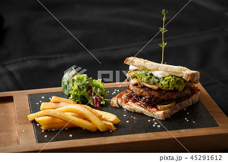 Top view of toast with fried bacon and potatoes 45291612