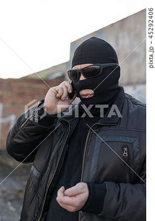 a bandit talking on the phone a bandit talking on the phone 45292406