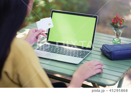 Online payment, Woman holding credit card for shop 45295868